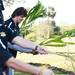 Michigan offensive linesman Taylor Lewan smiles as he feeds giraffes with teammates during a team outing at Busch Gardens in Tampa, Fla. on Saturday, Dec. 29. Melanie Maxwell I AnnArbor.com